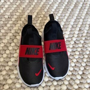 Nike Kids Slip-On Sneakers in Black and Red with White Sole